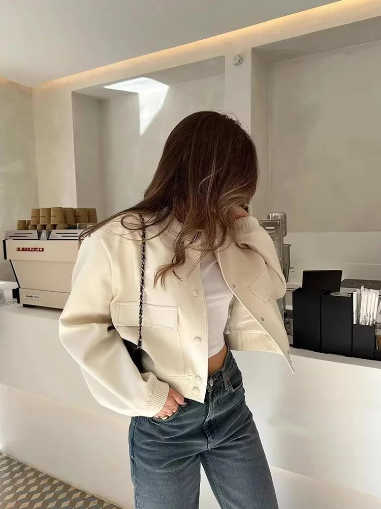 Women's Cropped Leather Bomber in apricot – The Maevora detail view 1