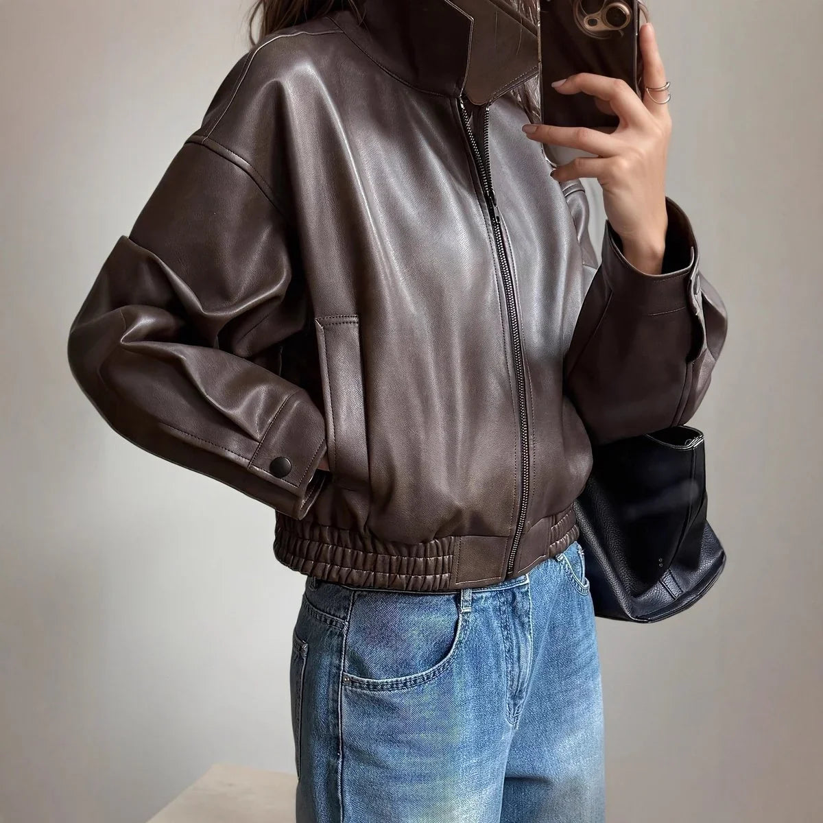 Women's Cropped Brown Leather Jacket in dark brown – The Valessa front view 1